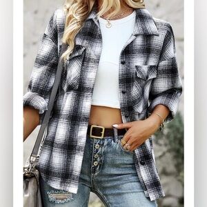 Classic black and white plaid collared roll up button coat.